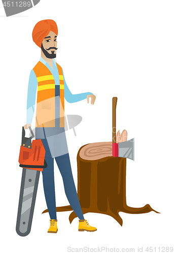 Image of Young hindu lumberjack with chainsaw.