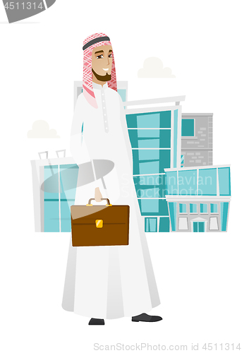Image of Muslim businessman holding briefcase.