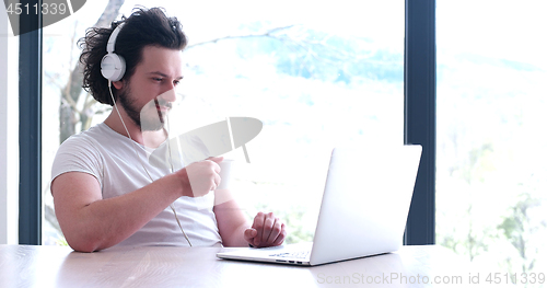 Image of man drinking coffee enjoying relaxing lifestyle