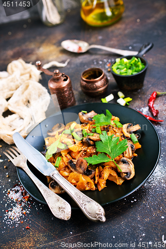 Image of Fried mushrooms and cabbage