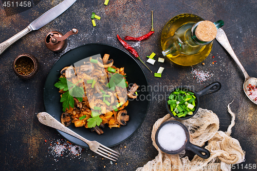 Image of Fried mushrooms and cabbage