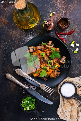 Image of Fried mushrooms and cabbage