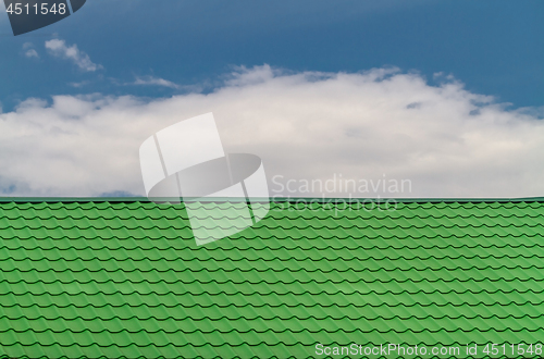 Image of Close up of bright green tile roof surface, abstract background texture