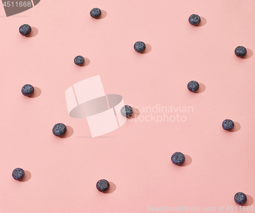 Image of blueberries on pink background