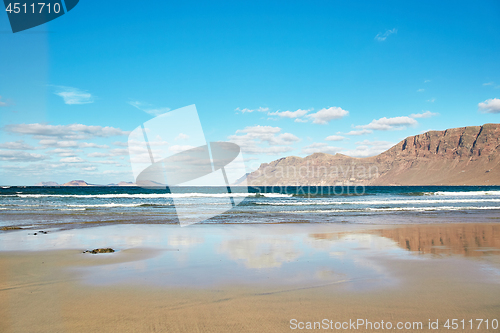 Image of Landscape with volcanic hills and atlantic ocean in Lanzarote 