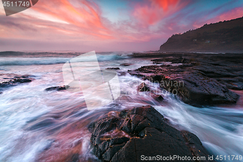 Image of Moody coastal waves and epic sky of Garie Beach