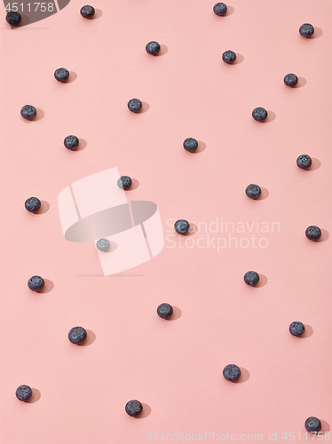 Image of blueberries on pink background