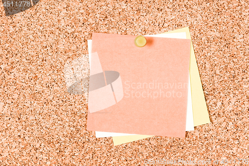 Image of Blank post-it notes on a corkboard