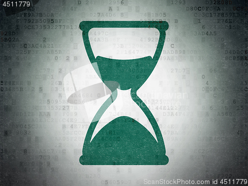 Image of Time concept: Hourglass on Digital Data Paper background