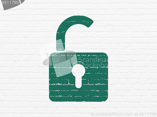 Image of Security concept: Opened Padlock on wall background