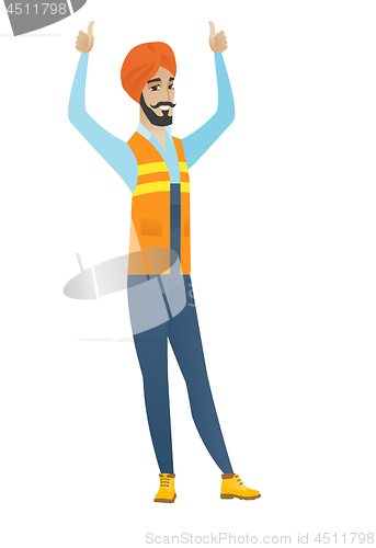 Image of Young hindu builder standing with raised arms up.