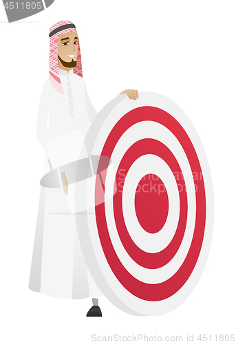 Image of Young muslim businessman and dart board.