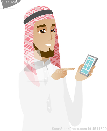 Image of Muslim businessman holding mobile phone.