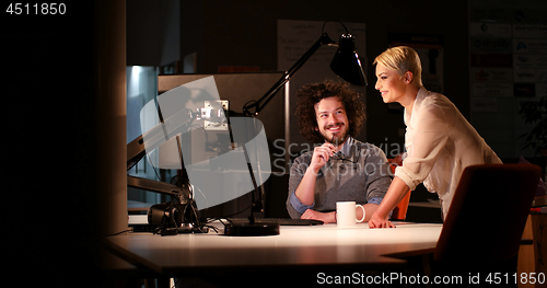 Image of young designers in the night office