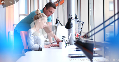 Image of Business People Working With laptop in office