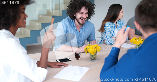 Image of Multiethnic startup business team on meeting