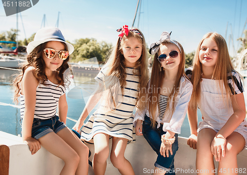 Image of The children on board of sea yacht