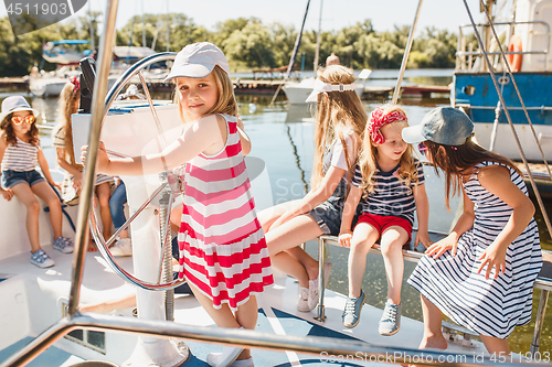 Image of The children on board of sea yacht