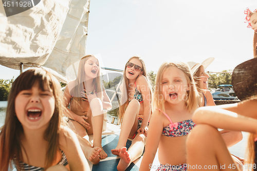 Image of The children on board of sea yacht