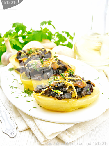 Image of Potatoes stuffed with mushrooms on towel