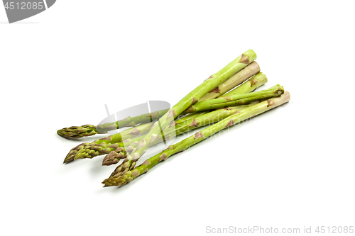 Image of Bunch of fresh raw garden asparagus isolated on white background