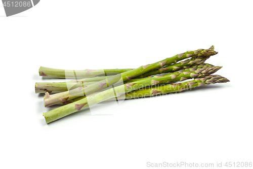 Image of Bunch of fresh raw garden asparagus isolated on white background