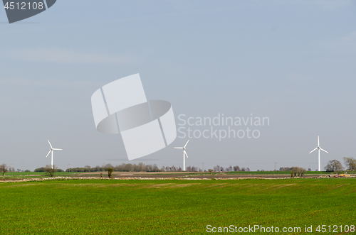 Image of Windmills in a green landscape at the swedish countryside