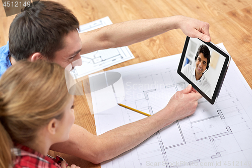 Image of couple having video call with architect