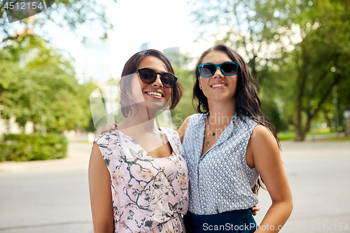Image of portrait of happy women or friends at summer park