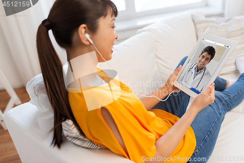 Image of patient having video chat with doctor on tablet pc