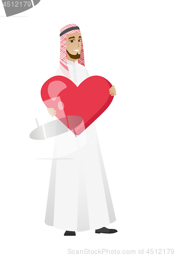 Image of Muslim businessman holding a big red heart.
