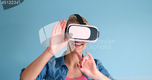 Image of woman using VR headset glasses of virtual reality