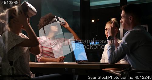 Image of Multiethnic Business team using virtual reality headset