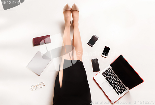 Image of Fashion blogger writing on laptop computer