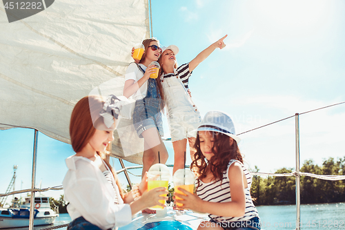 Image of The children on board of sea yacht