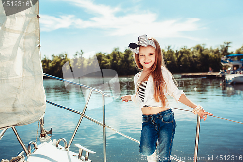 Image of The children on board of sea yacht