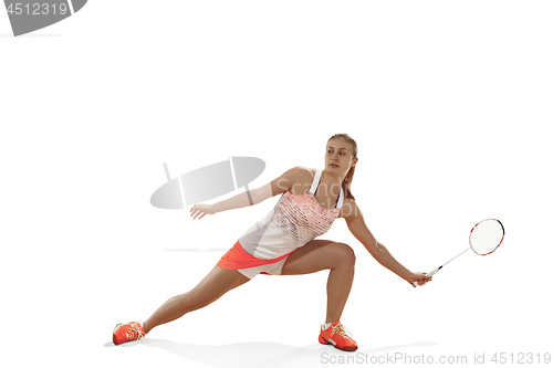 Image of Young woman playing badminton over white background