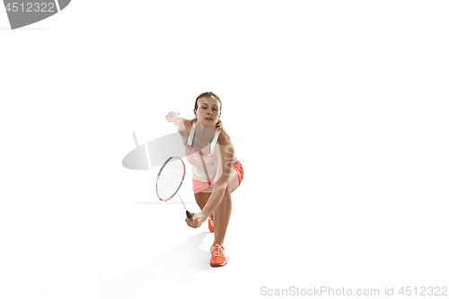 Image of Young woman playing badminton over white background