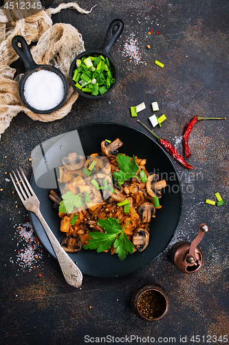 Image of Fried mushrooms and cabbage