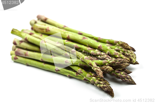 Image of Bunch of fresh raw garden asparagus isolated on white background