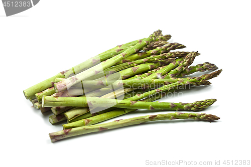 Image of Bunch of fresh raw garden asparagus isolated on white background