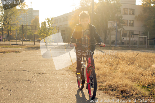 Image of Happy boy ride the bicycle