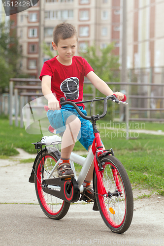 Image of Happy boy ride the bicycle