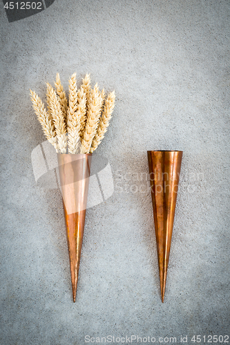 Image of Vintage copper cones and wheat ears