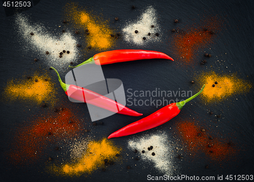 Image of Hot pepper seasoning on dark background