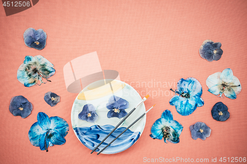 Image of Blue pansies and painted ceramic plate