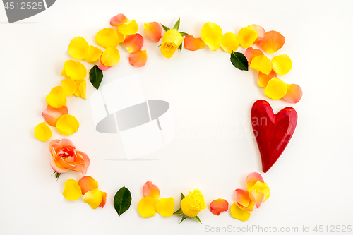 Image of Red heart and rose petals frame