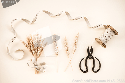 Image of Wheat ears and ribbon decoration