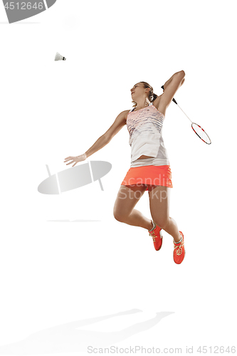 Image of Young woman playing badminton over white background