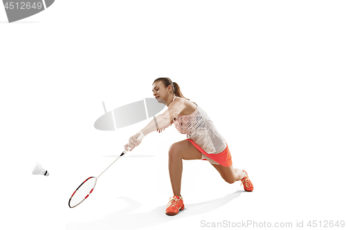 Image of Young woman playing badminton over white background